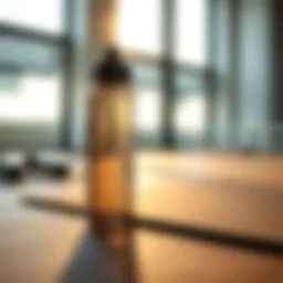 Stylish Advocare water bottle on a fitness mat