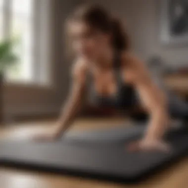 Individual performing a core-strengthening exercise on a mat