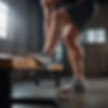Elevated Lunges: Unlocking Your Leg Potential A close-up of a foot elevated on a bench doing a lunge, emphasizing balance and strength development.