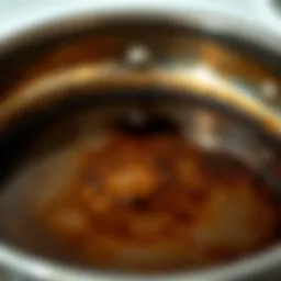 Stainless steel pan with burn marks