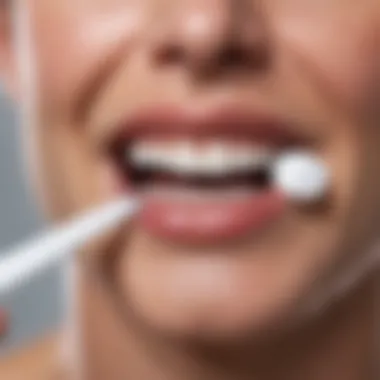 User applying a teeth whitening strip at home