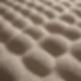 Close-up of a plush memory foam topper showcasing its texture and contouring ability.