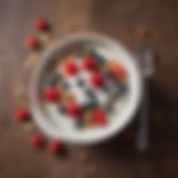 A vibrant bowl of Greek yogurt topped with fresh berries and nuts