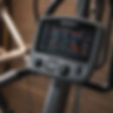 Close-up of a stationary bike's digital display and features