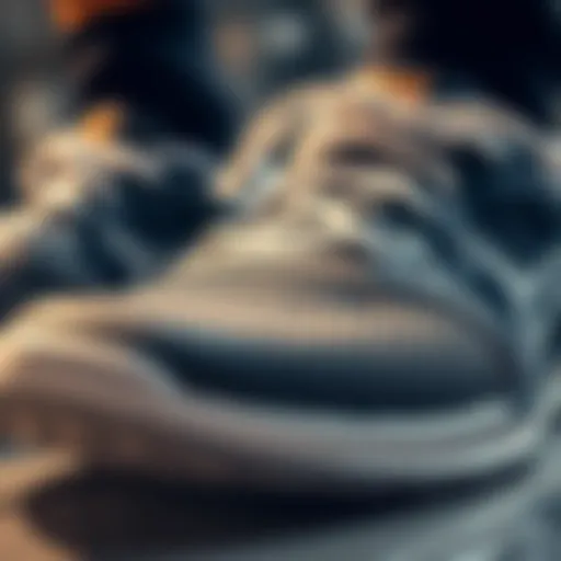 Close-up view of tennis shoes showcasing grip texture