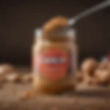 A close-up view of a peanut butter jar with a spoon