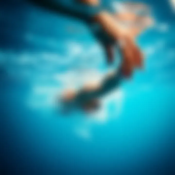 Mastering Techniques: The Art of Effective Swimming An athlete showcasing a powerful swimming stroke in clear water