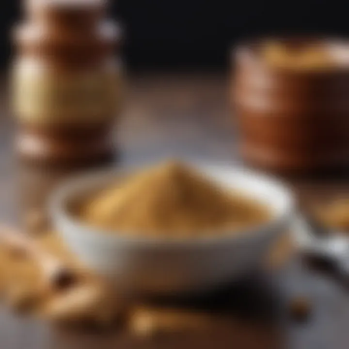 Ginger powder in a small bowl with a spoon