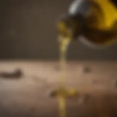 Olive oil pouring from a bottle