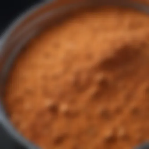 A close-up of Metamucil powder in a container, showcasing its texture and color.